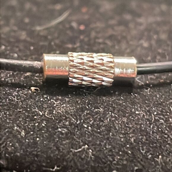 7” black metallic bangle bracelet w/0.5” silver tone diamond etched charm - Picture 6 of 8